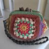 Crocheted granny square cosmetic bag