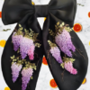 Elegant black hair bow with hand-embroidered purple blooms